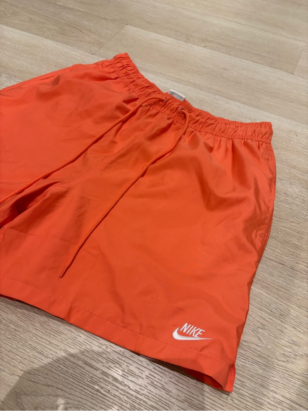 Nike Men’s Orange Athletic Shorts with White Swoosh